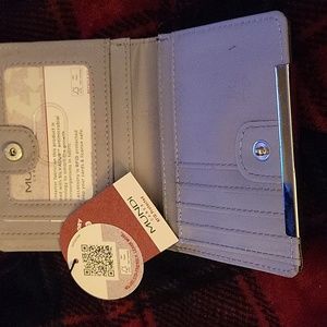 Wallet A beautiful wallet. New with tags.